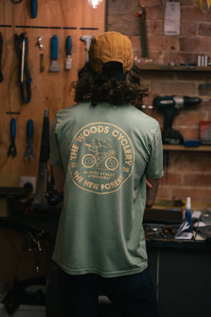 The Woods Cyclery Logo T-Shirt - Sage Green